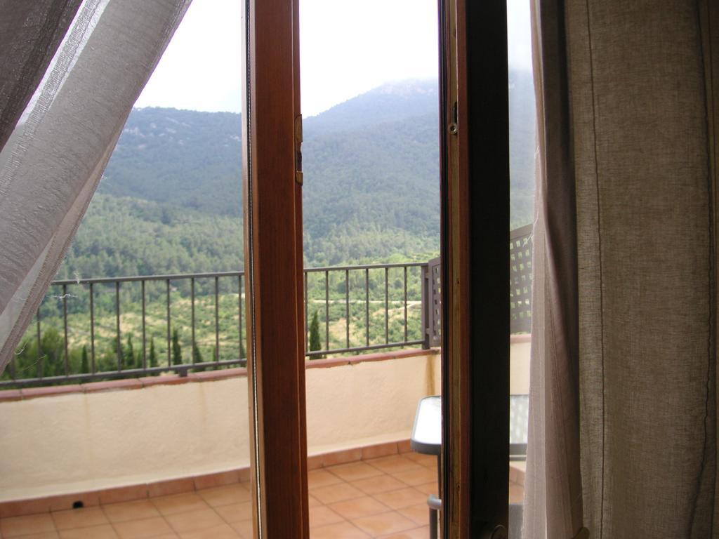Aire De Colldejou Hotell Rum bild